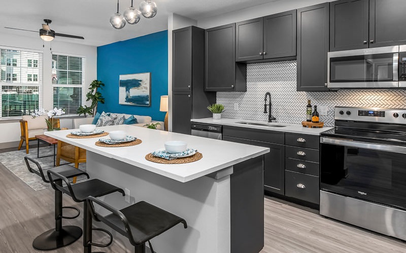 Open concept living space with island kitchen in units at The Westerly