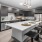 bright lighting in modern kitchen with stainless steel appliances