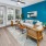 Living room with vinyl plank flooring and access to private patio
